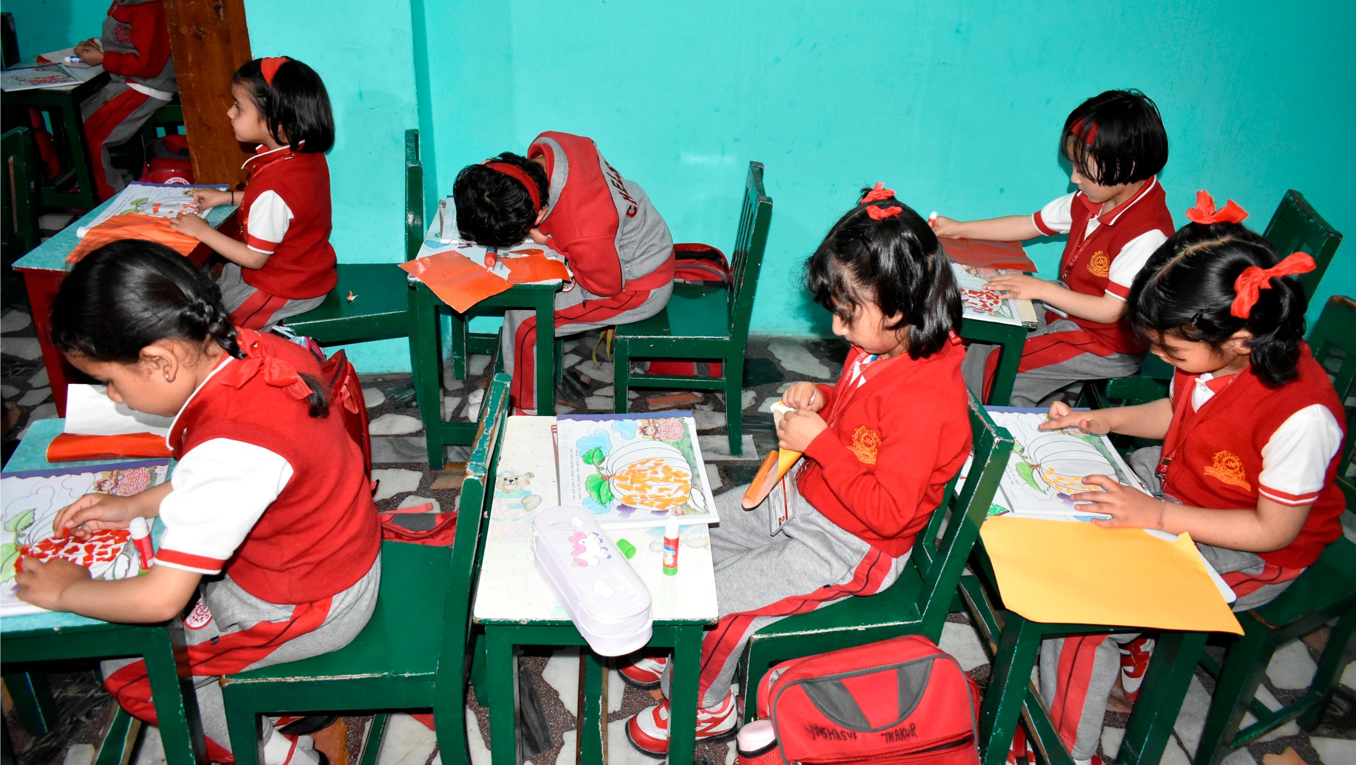 TEARING AND PASTING OF PAPER AND DECORATING PUMPKIN ACTIVITY (KG)